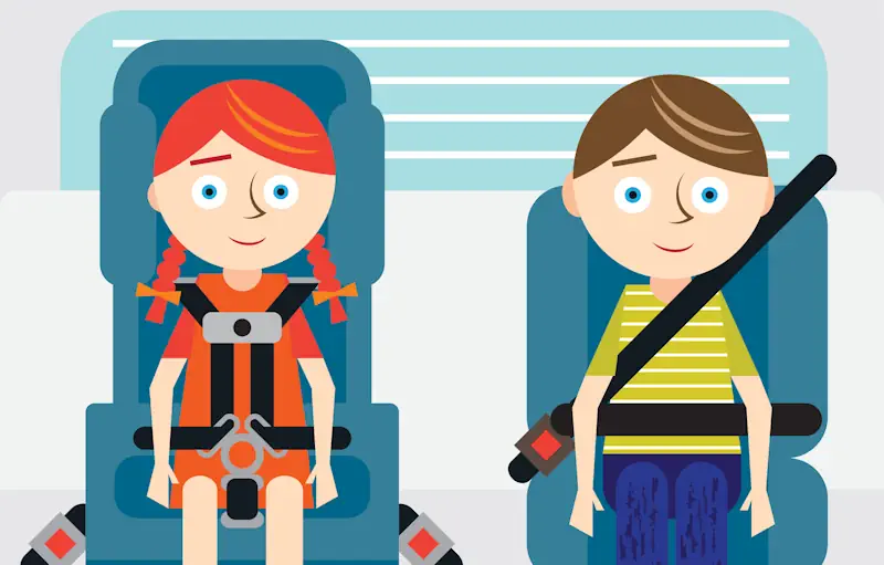 Two children in approved child restraints